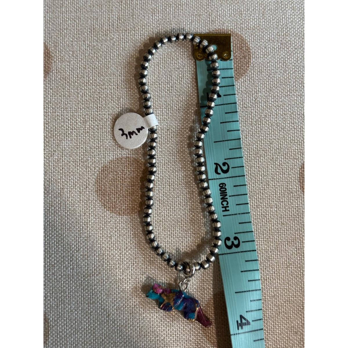 Southwestern 3mm Pearl Bead 7" Bracelet with Hand-Carved Spiny Orange Wolf Charm